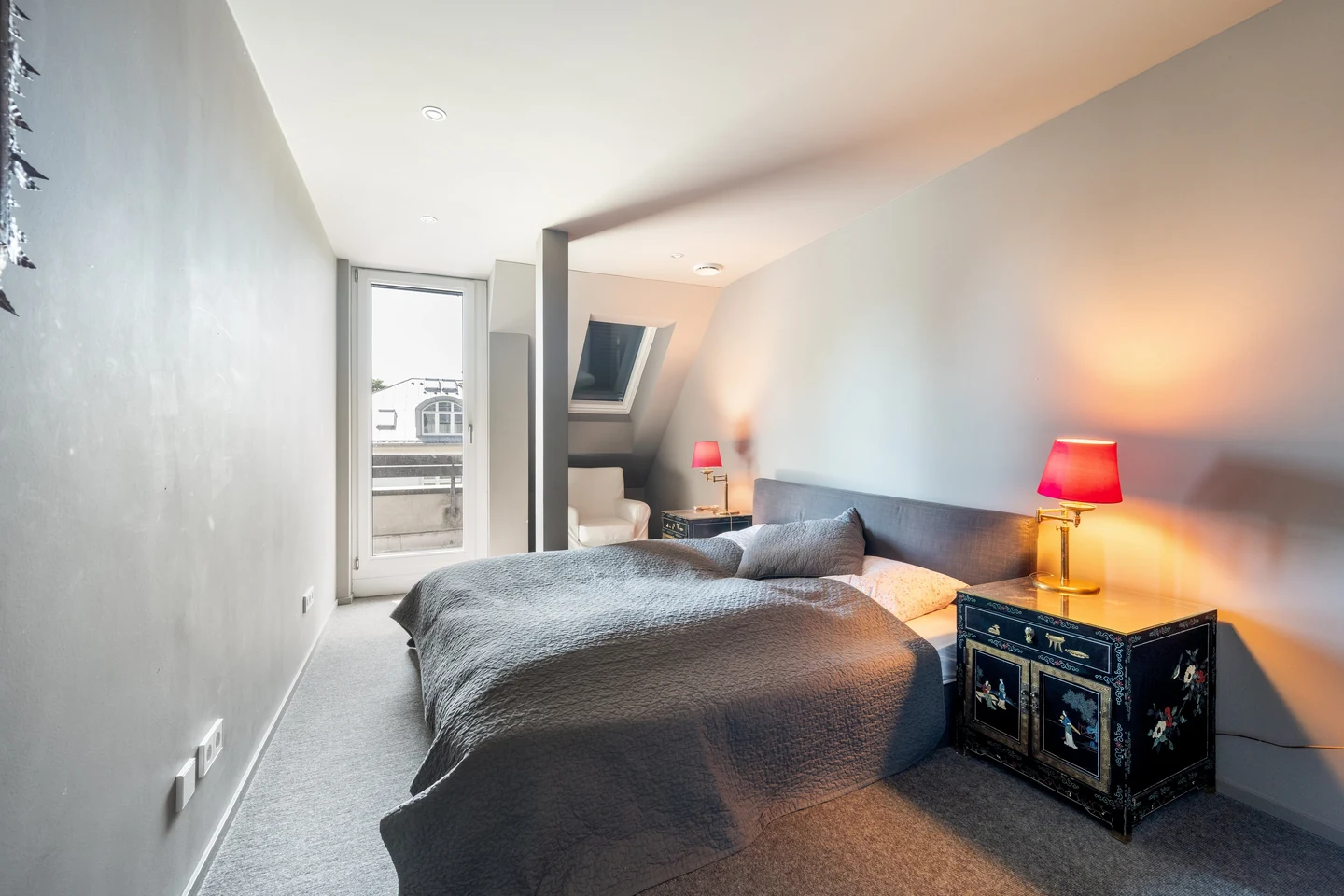 Schlafzimmer mit Balkonzugang